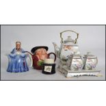 A collection of teapots to include examples such as  Franklin Mint Ltd edition teapot with creamer