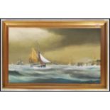 A 20th century famed oil on canvas painting of a coastal shipping scene on stormy waters signed to