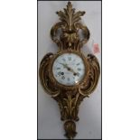 A good19th Century French brass ormulu Cartel Clock by Raing & Frer Paris. The case of flowering