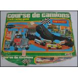 An unusual vintage 20th century French Course De Camions truck racing game - slot car. In the