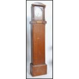 An early 20th century oak cased mantel clock with
