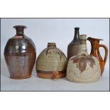 A good group of vintage 20th century studio pottery to include an Ewenny jug, vases, believed Tremar