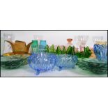 A large collection of studio art glass to include a peach glass dessert set, a set of six wine