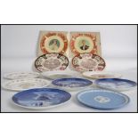 A collection of 11 boxed ceramic collectors plates to include examples by Masons, Coalport, Spode