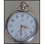 A vintage 20th century Omega gentleman's silver cased pocket watch having winder to top with