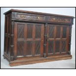 A 19th century Victorian Arts and Crafts ecclesiastical  oak and ebony inlaid sideboard dresser