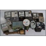 A large collection of vintage 20th century industrial / steampunk electric meters, gauges, dials,