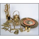 A good collection of 20th century copper and brass wares to include drinks measures in the form of