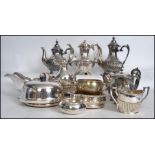 A collection of silver plated wares to include large teapot and coffee pot with matching sugar