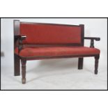 A mid century solid wood municipal railway / train station waiting room interior bench seat with