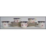 A good group of five early 20th century Royal Albert Crown china trios in an Imari / chintzy pattern