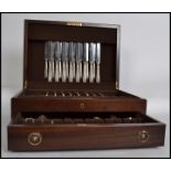 A good canteen of cutlery being complete within a quality hinged mahogany canteen. The service being