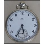 A vintage 20th century Omega gentleman's silver white metal cased pocket watch having winder to