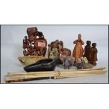 A collection of Chinese soapstone carvings to include ox, elephant, monkeys, budhha. Also