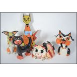 A group of Lorna Bailey ceramic cats all signed to include standing, seated, and a Purrdy wall