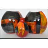 A group of retro 20th century Poole Gemstone pattern pottery to include a pair of moon vases and a