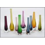 A collection of studio art glass vases, mainly sol