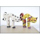 Two Lorna Bailey ceramic pottery cats in arched stretching positions both signed one limited edition