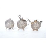 A trio of early 20th century rococo silver ( tested silver believed Continental ) condiments to