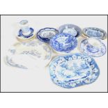 A collection of 19th century blue and white ceramics to include Wedgwood, Spode, Flow blue etc.