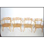 A set of four retro rare Ercol 493 Windsor Carver