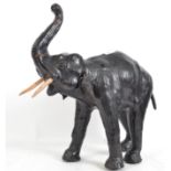 A good 20th century leather covered elephant compl