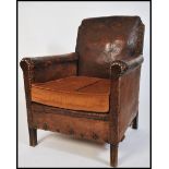 A 1930's Art Deco leather French club armchair rai