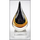 A mid century studio art glass sculture of teardro