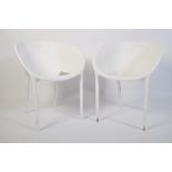 A pair of contemporary Philippe Starch white plast