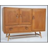 A good mid century Ercol Windsor pattern sideboard