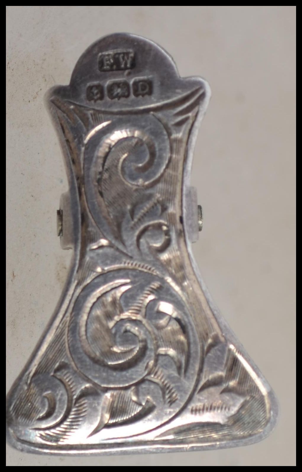 A hallmarked silver napkin clip having an engraved - Image 5 of 5