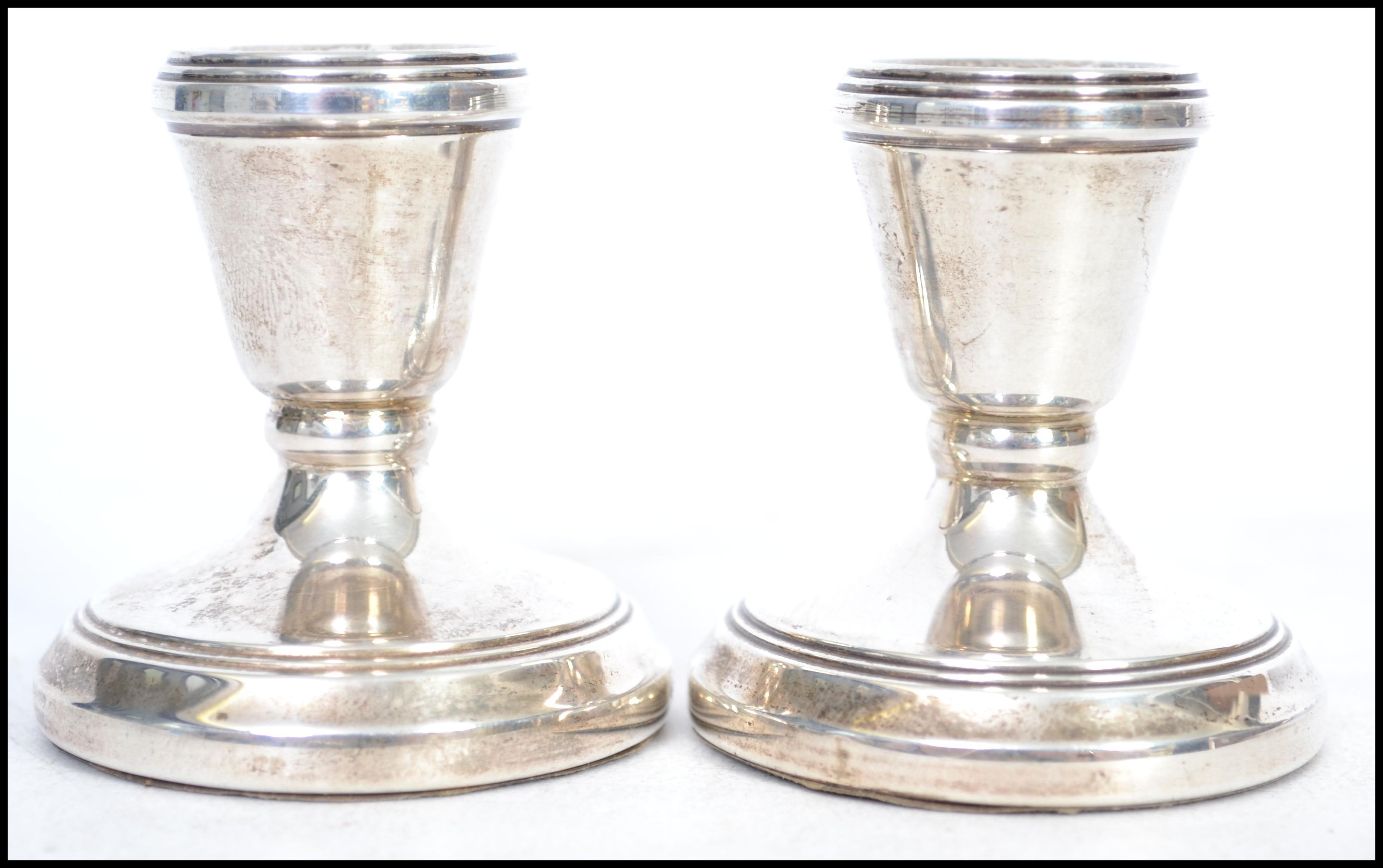 A pair of hallmarked silver candlesticks of squat - Image 2 of 6