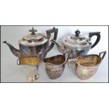 Two silver plate tea services one being an Elkingt
