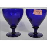 A pair of 19th century Victorian Bristol Blue glas