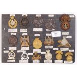 MILITARY UNIFORM CAP BADGES