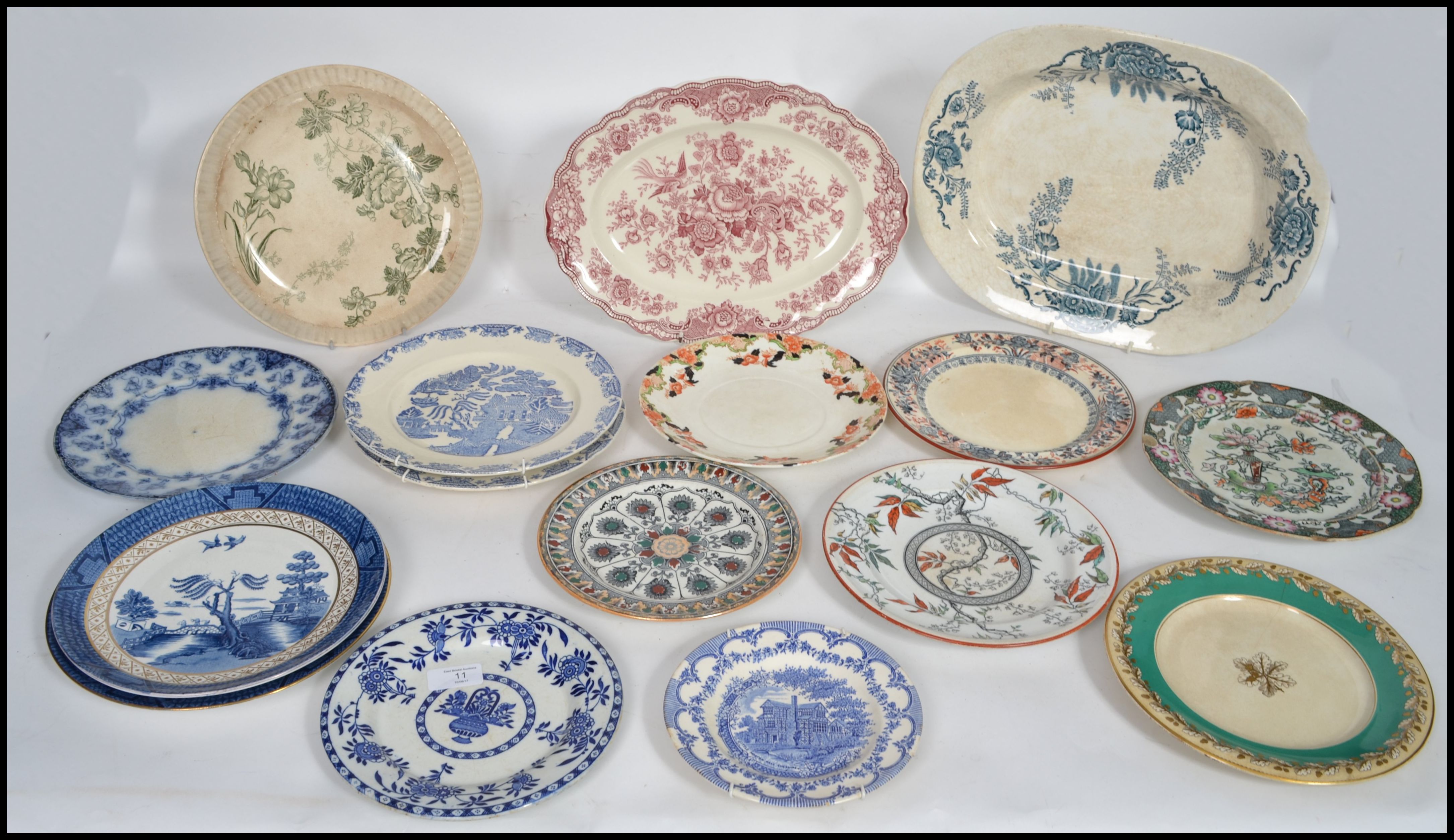 A large collection of Victorian and other ceramic plates and trays of varying patterns to include