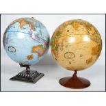 A pair of retro 20th century terrestrial globes, b