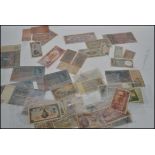 A large collection quantity of vintage 20th century bank notes mostly WW2 related to include,