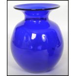 A group of 20th studio art Bristol Blue glass wares to include paperweight, vases, ashtray along