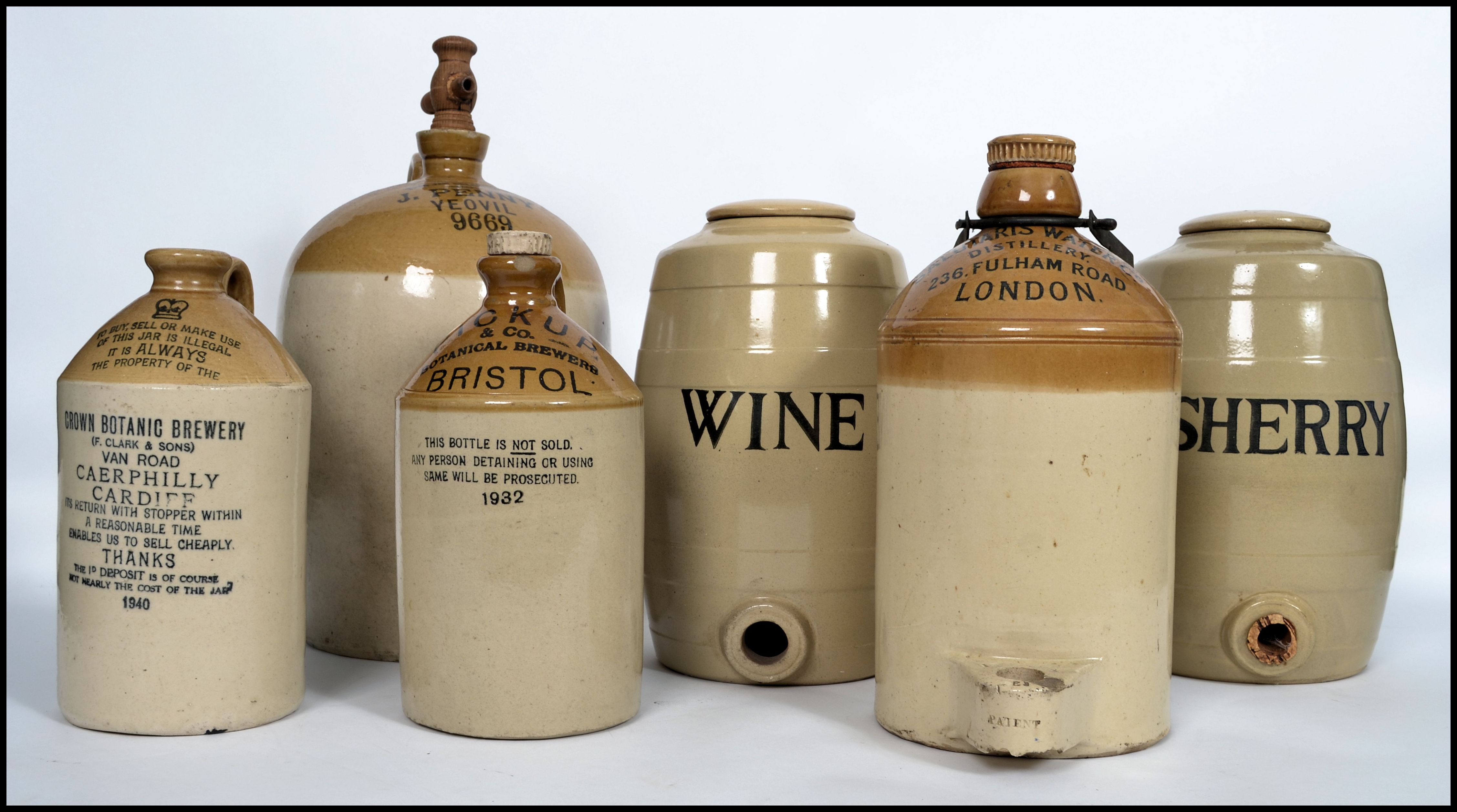 A good collection of vintage stoneware advertising jugs/flagons to include local interest, Bristol