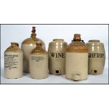 A good collection of vintage stoneware advertising jugs/flagons to include local interest, Bristol