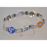 A believed Norwegian / Danish silver and enamel bracelet designed with flower heads in the manner of