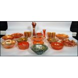 A good collection of vintage 20th century studio art carnival glass to include vases, set of six