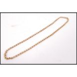 A 9ct gold chain( unmarked but tests ) having barrel clasp af. Total weight 6.8g