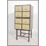 A vintage retro 20th century stack of two industrial set of eight filing / index drawers cabinet, in