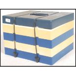 A retro camping 1970's ' pac a pic ' stacking picnic box in unusual blue and white colourway.