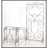 A collection of outside decorative wrought iron ob
