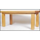 A good chunky oak furniture land type refectory style dining table being raised on squared legs with