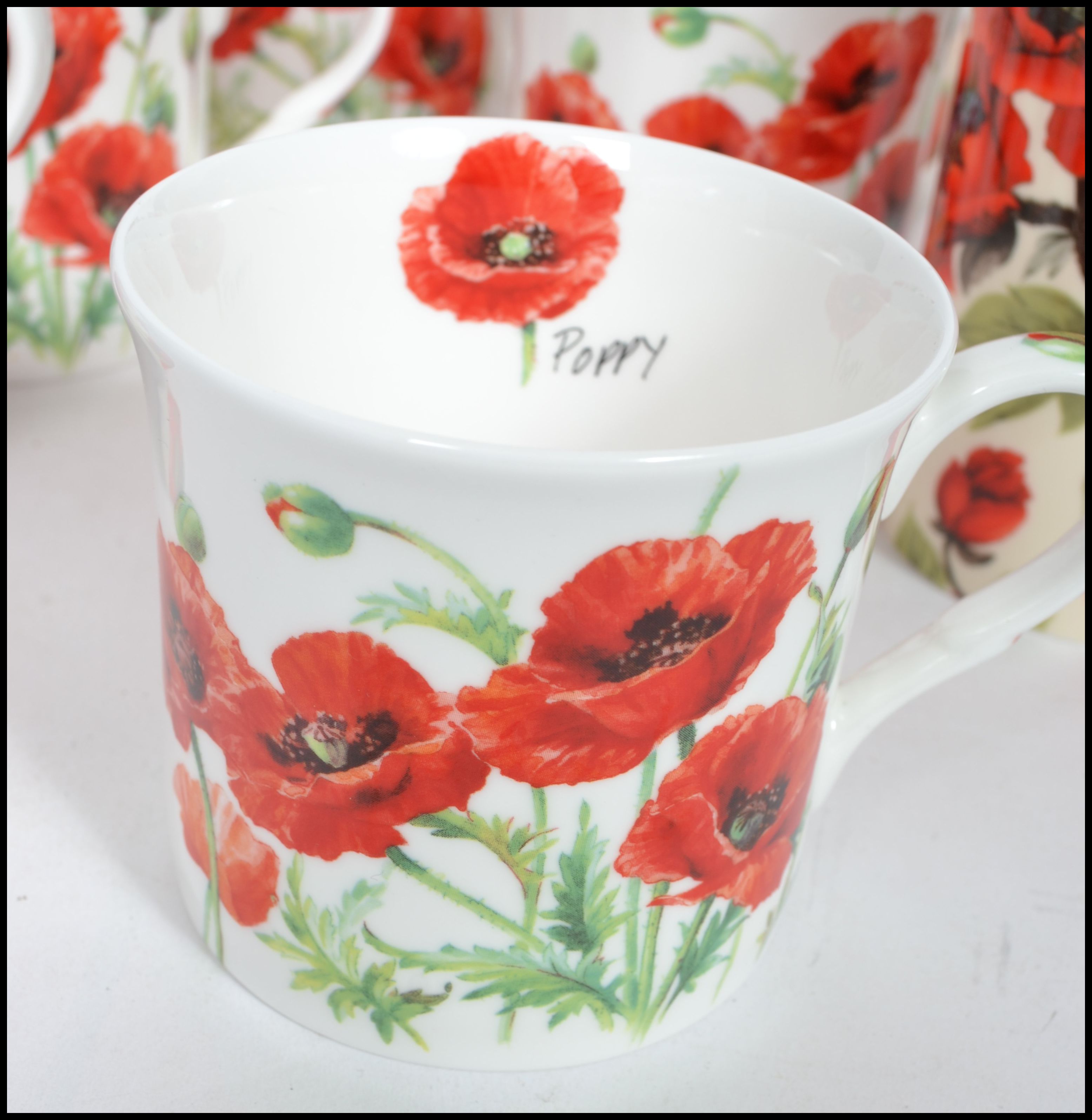 A good group of ceramic twelve coffee cups and 10 tea cups all with poppy flower design. Makers - Image 6 of 9