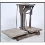 A set of early 20th century Parnell Bristol Industrial Farm twin corn / food weighing scales made of